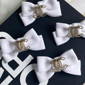 CHEWNEL DOG BOW HAIR CLIP